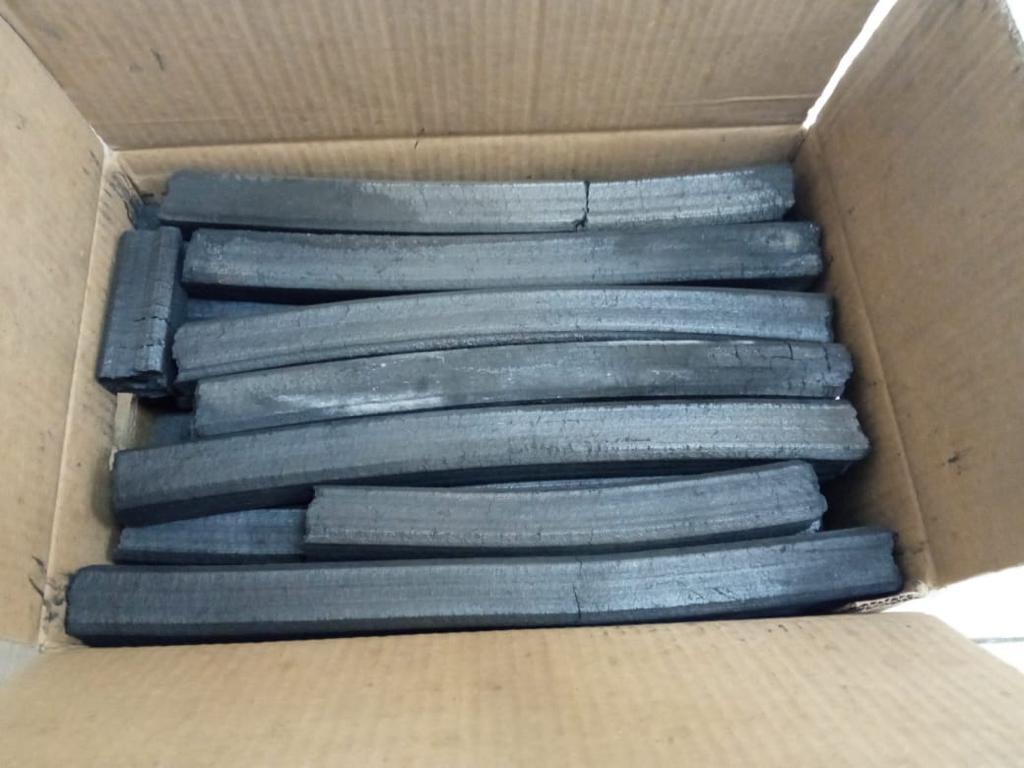 Eco-friendly sawdust charcoal briquettes securely packaged for global wholesale distribution