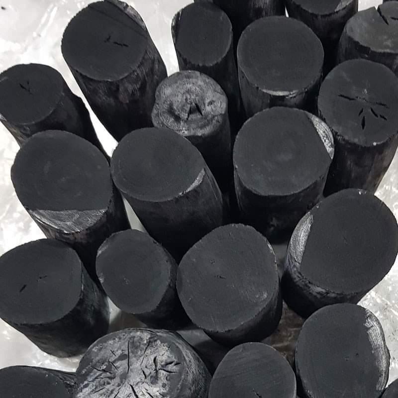 Close-up of premium sustainably sourced mangrove charcoal with deep black color and natural sheen